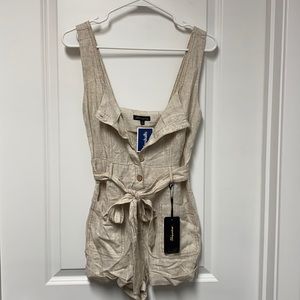 Size S cream Button up Romper